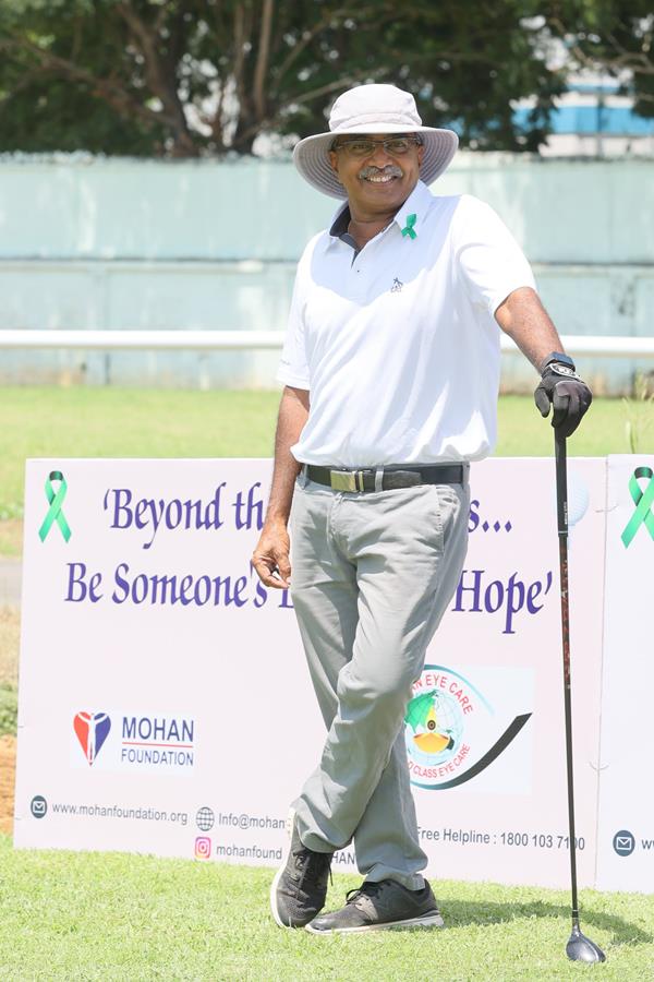 Golfer enjoying moment in course