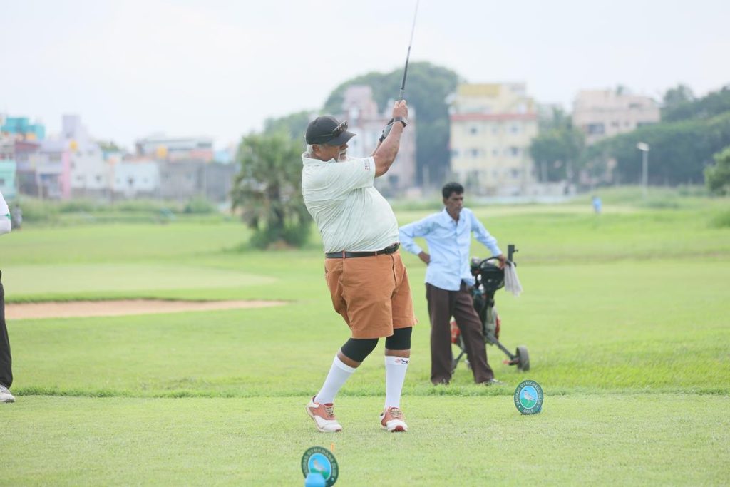 golfer enjoying shots in course